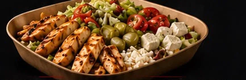 A chicken rice box, grilled strips over spiced rice with olives, feta and tomato