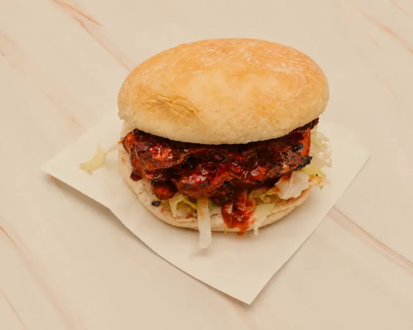 The Sunrise burger: two flame-grilled thigh fillets with sweet chilli jam